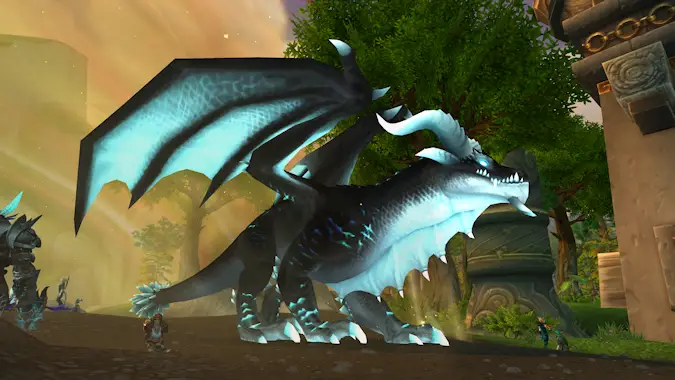 An infinite dragon fills the frame, golden sands swirling behind her.