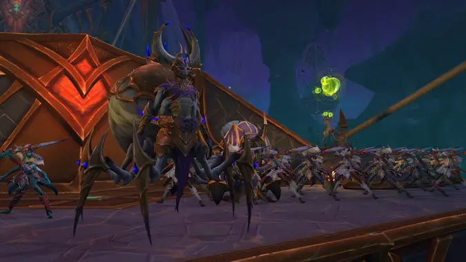 A cadre of crab-legged nerub'ar stand upon a stone ledge, ready to fight.
